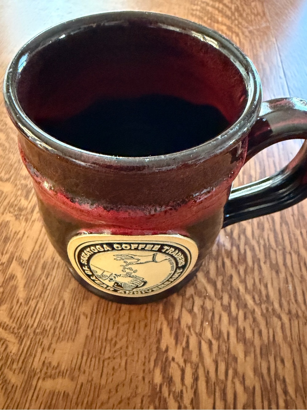Saratoga Coffee Traders Handcrafted Ceramic Coffee Mug in Dark Brown and Red